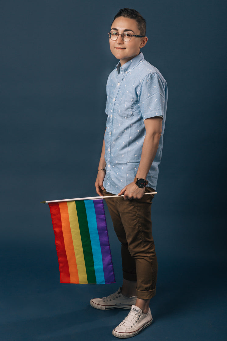 Person Holding Small Pride Flag Portrait