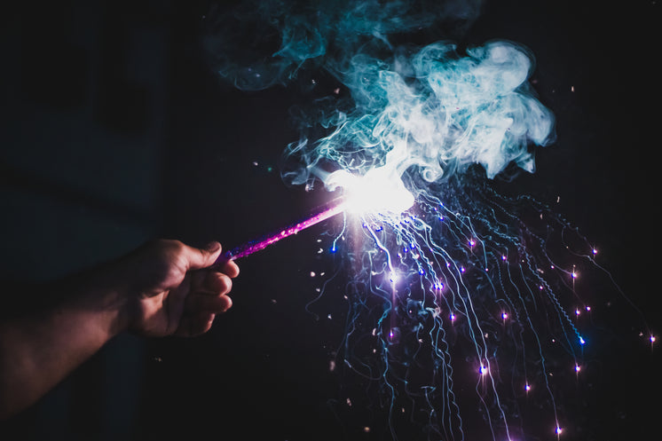 person-holds-lit-firework-with-purple-smoke.jpg?width=746&amp;format=pjpg&amp;exif=0&amp;iptc=0