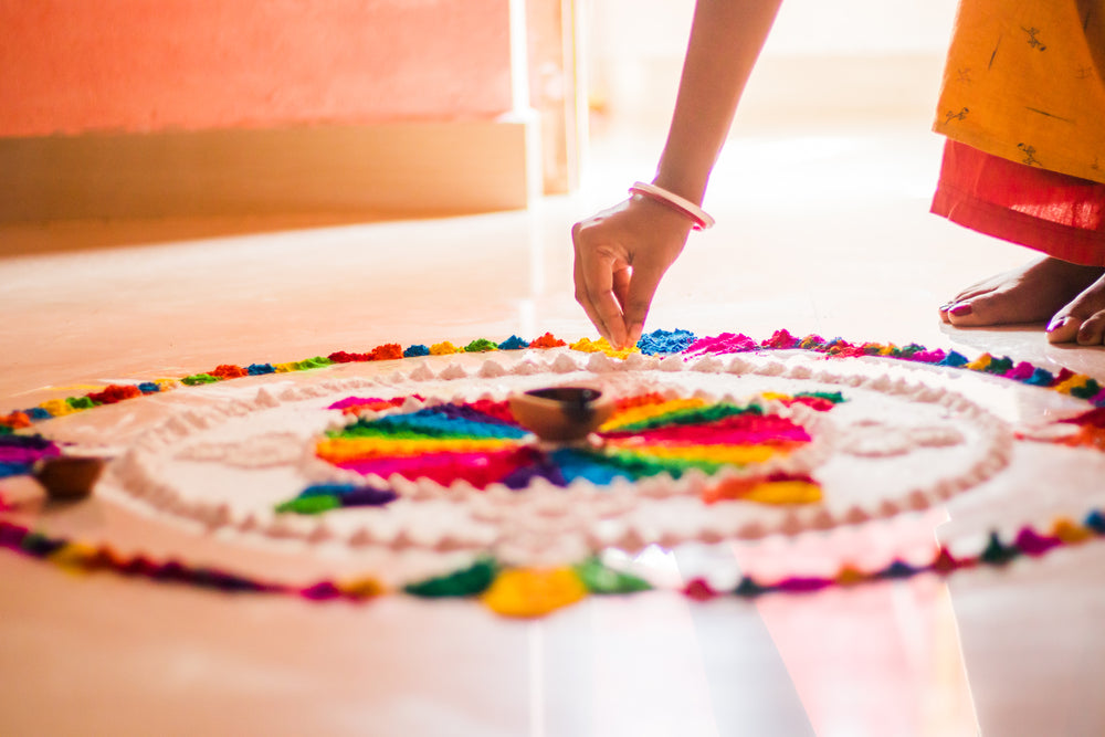 person lays pigment on the floor