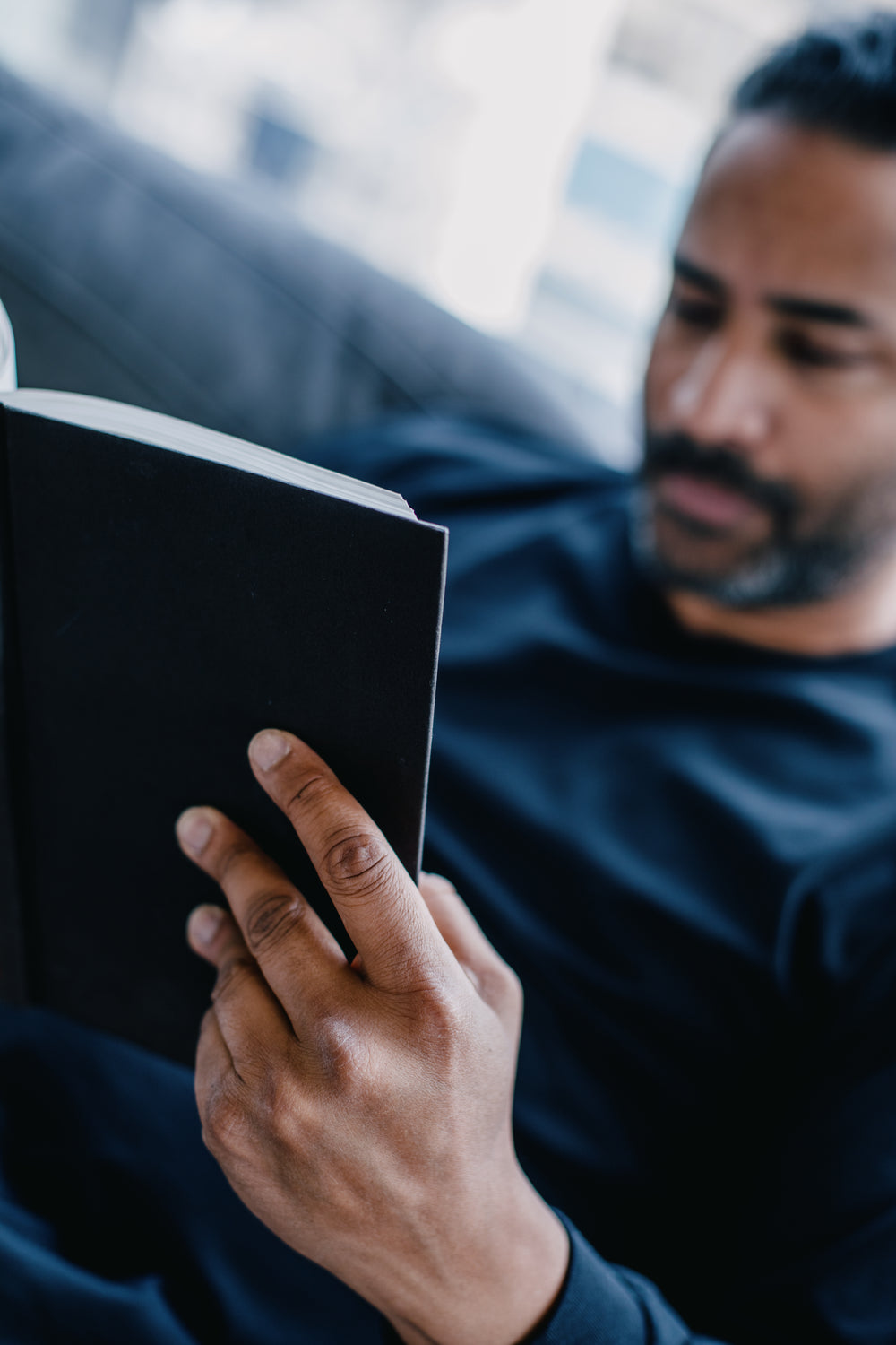 person reads a book photo