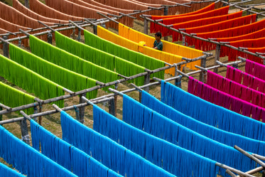 person tends to trying colorful string