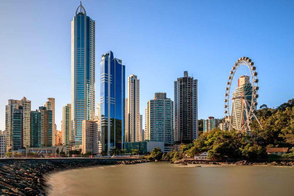  photo of a cityscape with a ferris wheel