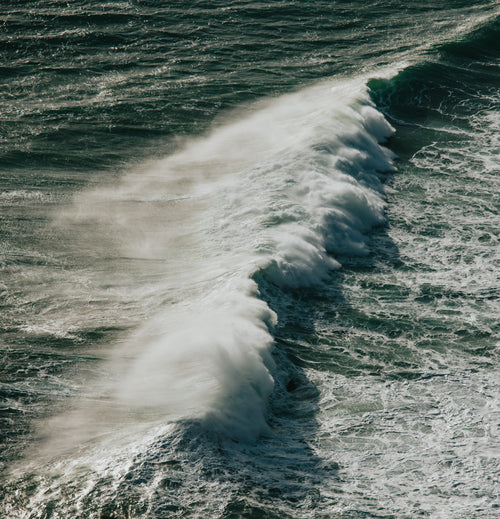 photo of a large wave in the ocean
