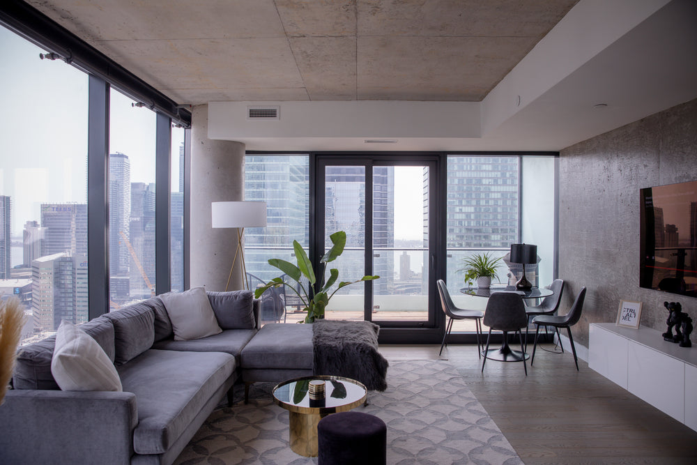 photo of a living room with large windows