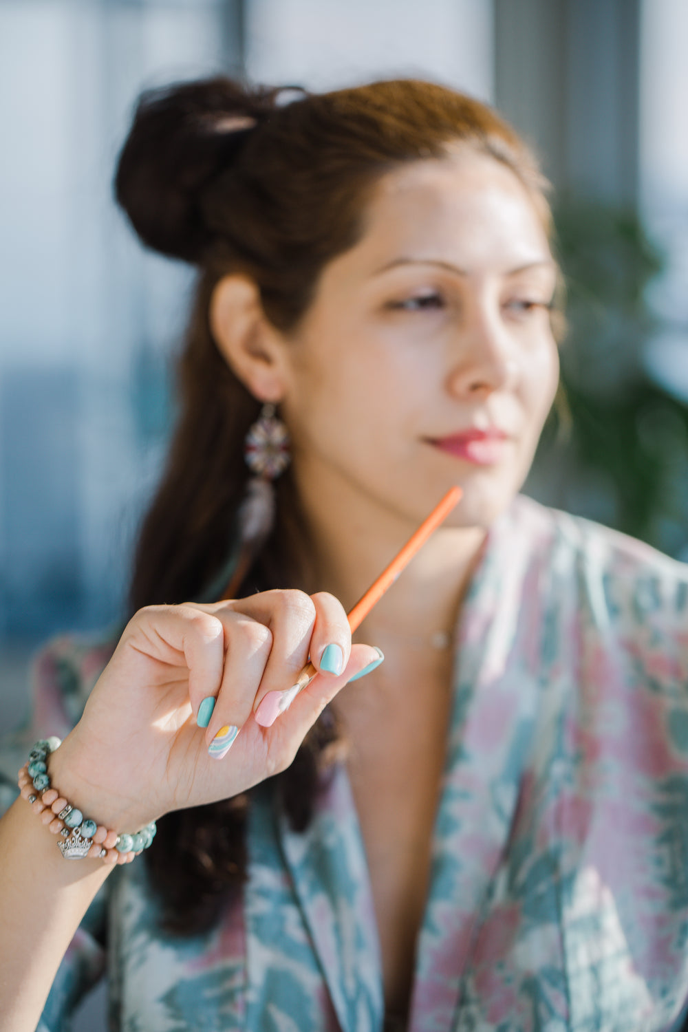 photo of a person holding a paintbrush