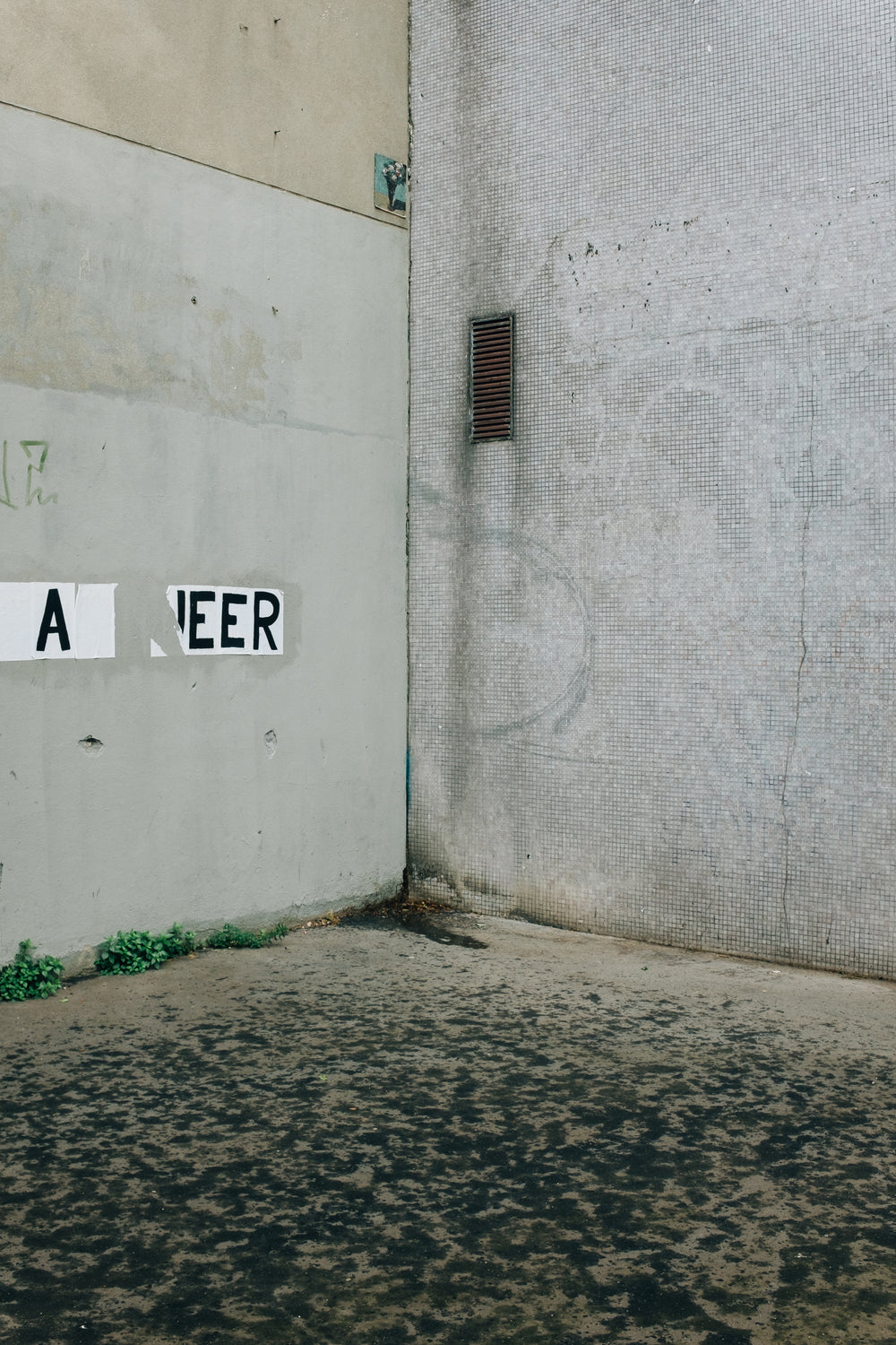 photo of a street corner where two buildings meet