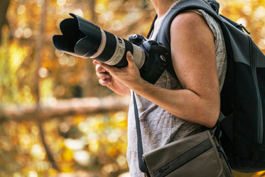 photographer holding camera