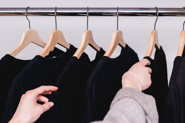 picking-a-dark-shirt-from-a-clothes-rack