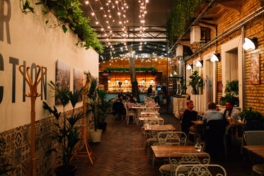 picturesque restaurant under fairy lights