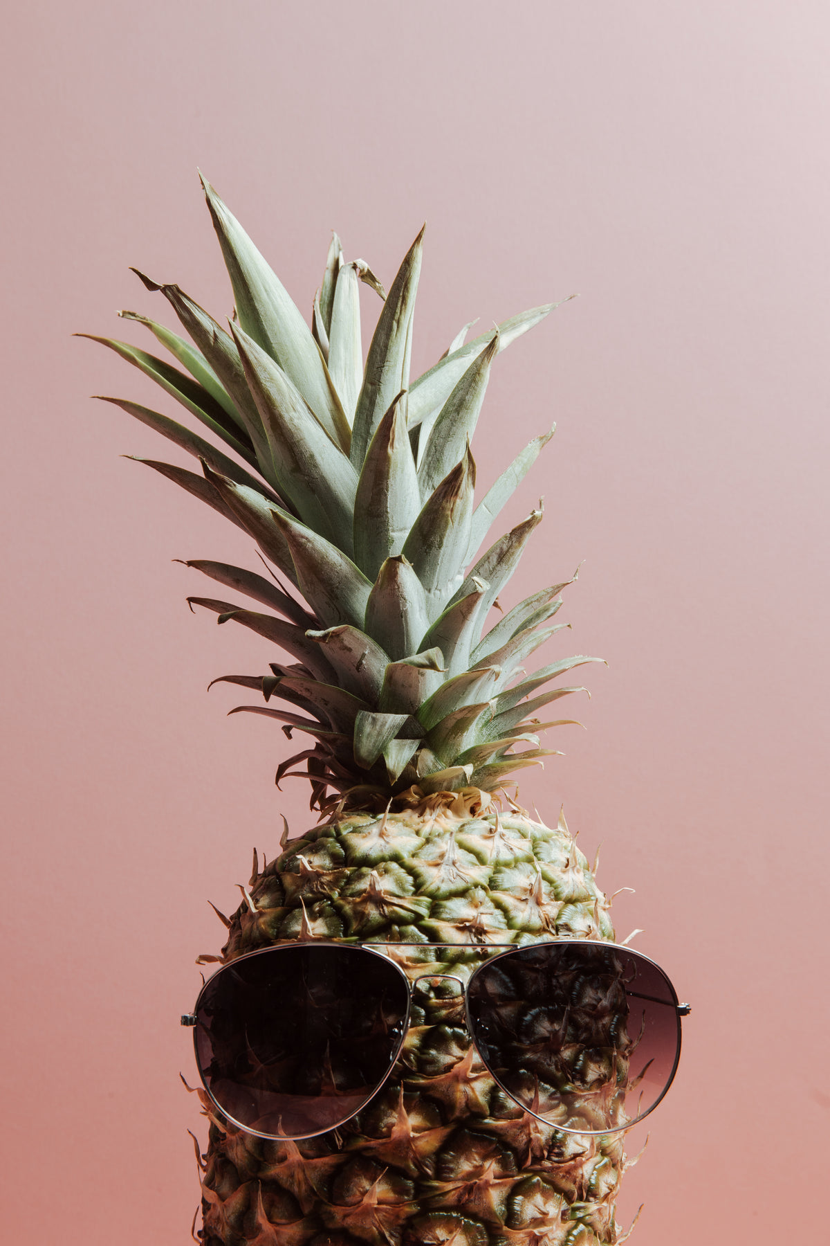 pineapple with aviator sunglasses
