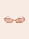 pink and beige sunglasses against soft white