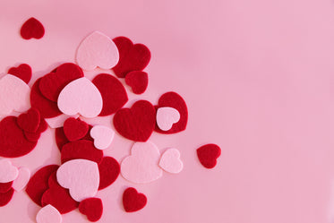 pink and red hearts on a pink surface