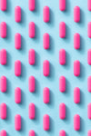 pink pill pattern on a blue background