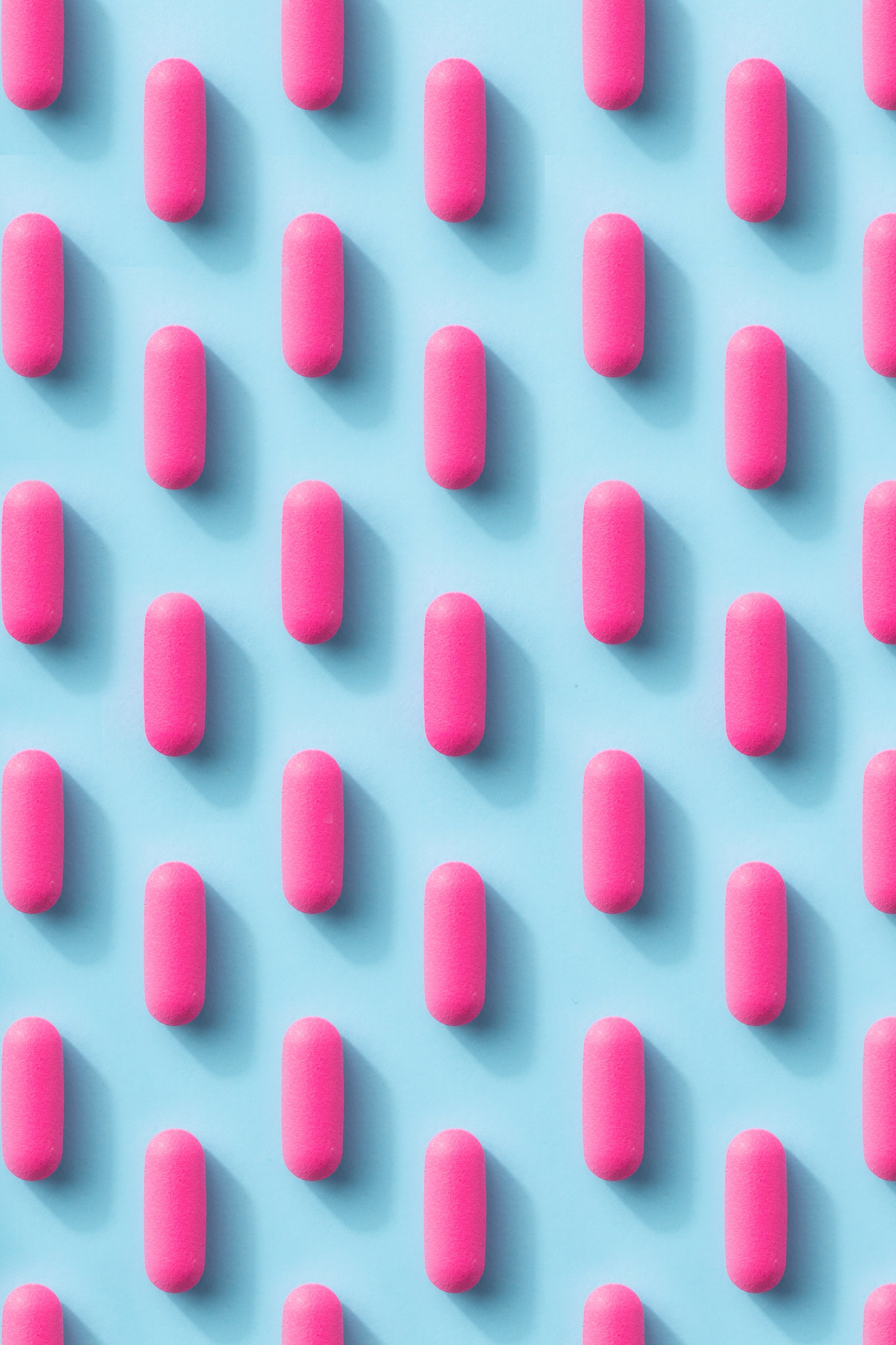 Browse Free HD Images of Pink Pill Pattern On A Blue Background