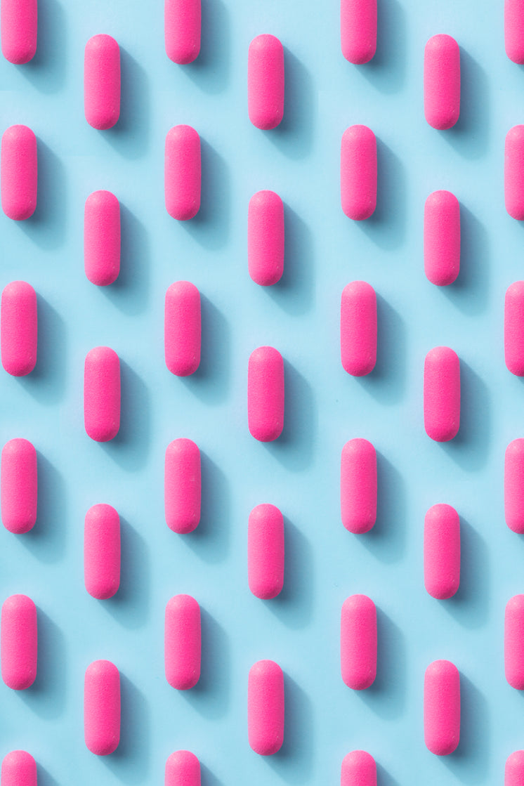 pink-pill-pattern-on-a-blue-background.j