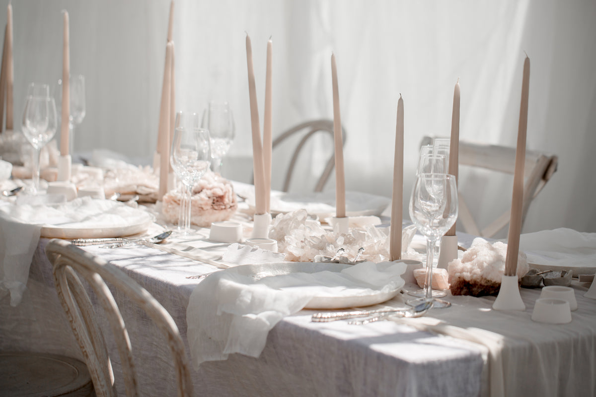 pink wedding table setting with crystals
