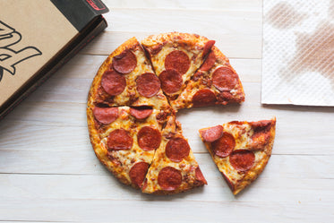 pizza sliced near box