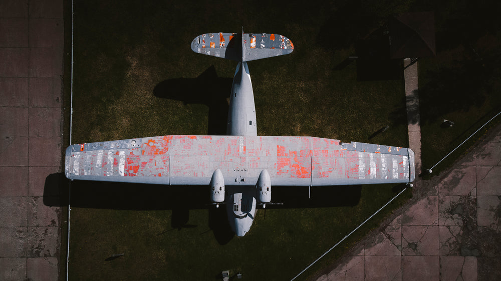 plane casts a shadow on the ground