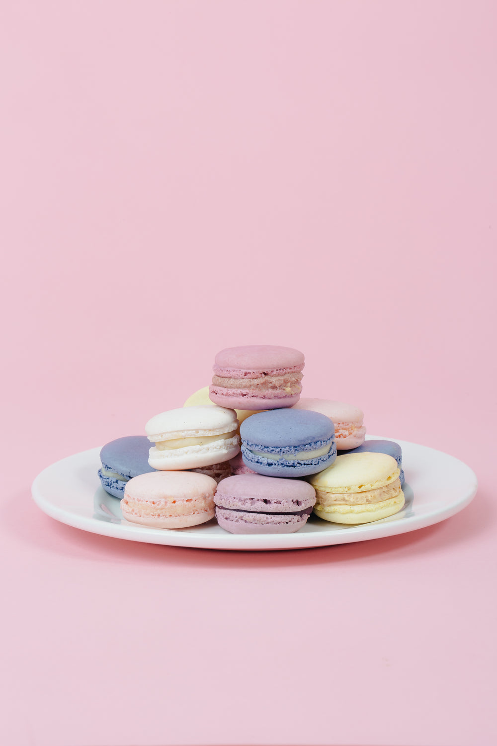 plate of pastel macarons portrait