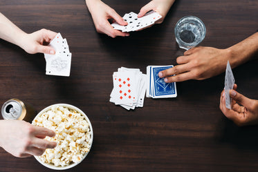 playing card games at a table