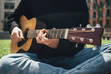 playing guitar in the park