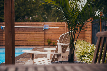 poolside chairs in rain