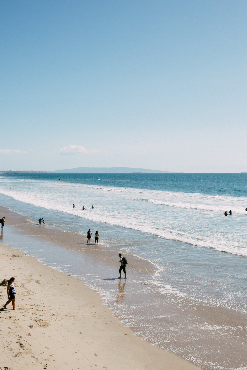 portrait image of sunny day at beach