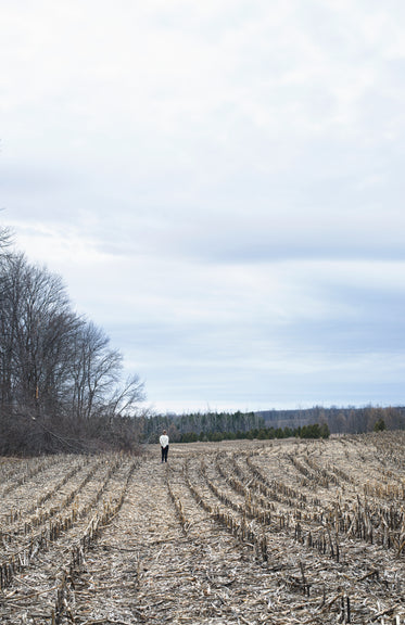 portrait of a woman alone in a field