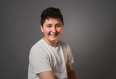 portrait of an androgynous person smiling