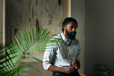 portrait of man with plant