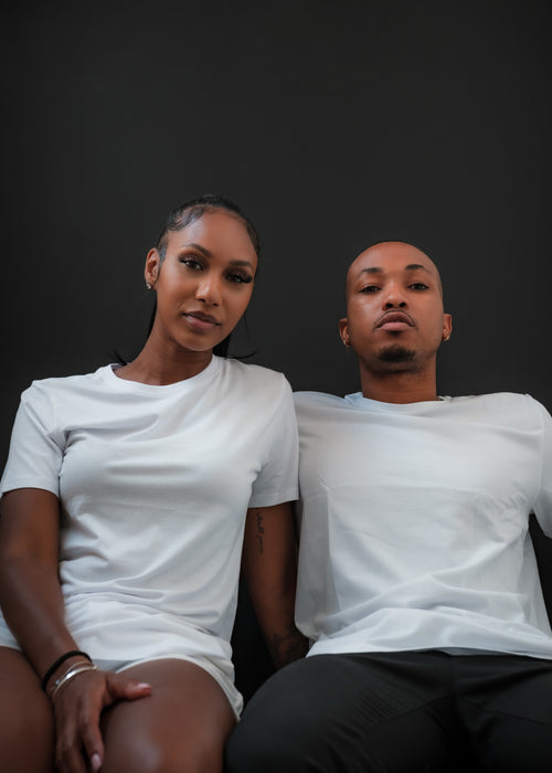 portrait of two people in crisp white shirts