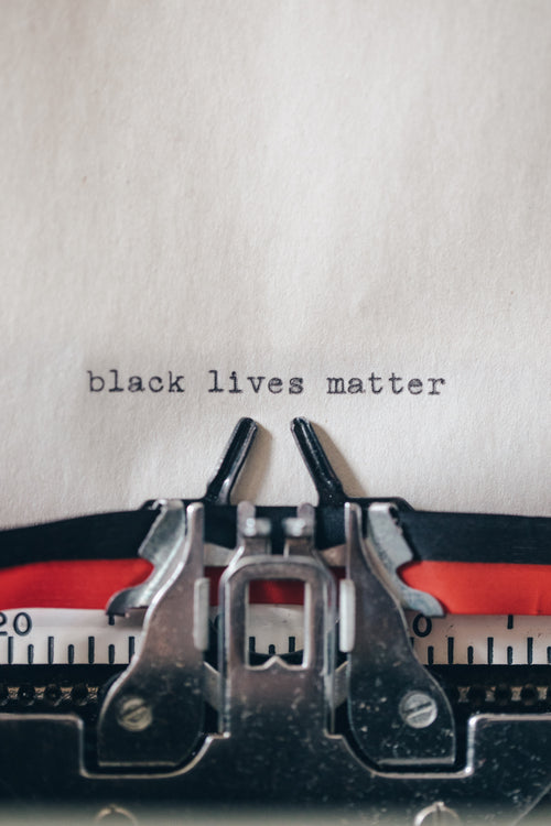 portrait of typewriter with black lives matter