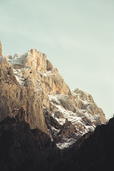 portrait view of snowy mountain in the sun