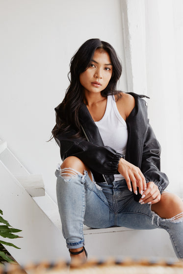 posing in denim and leather