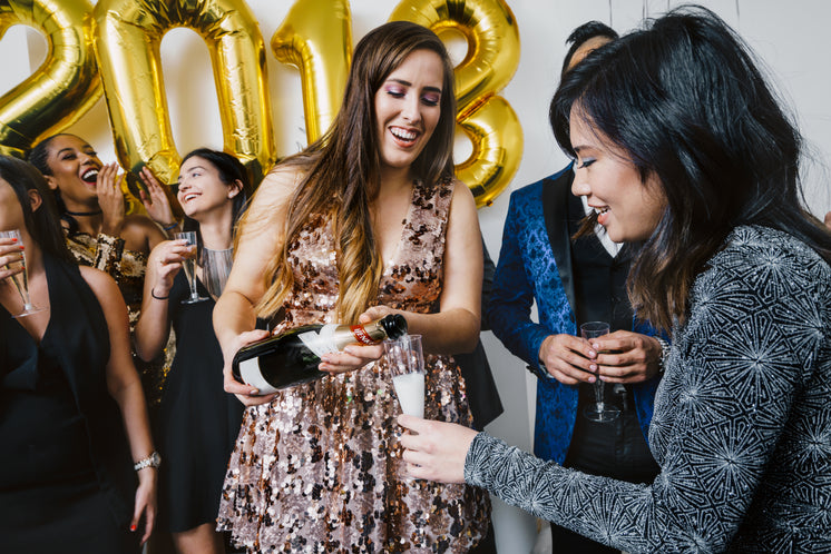 Pouring New Years Champagne