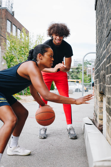 practicing basketball dribbling