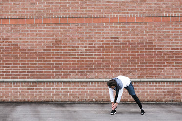 pre run stretch by wall