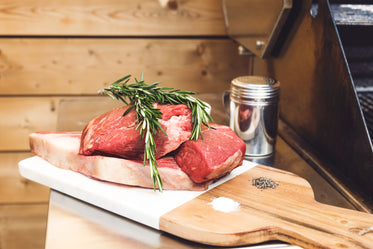 preparing meat to grill