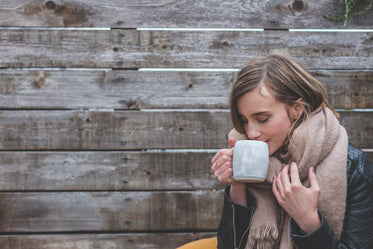 woman sipping coffee