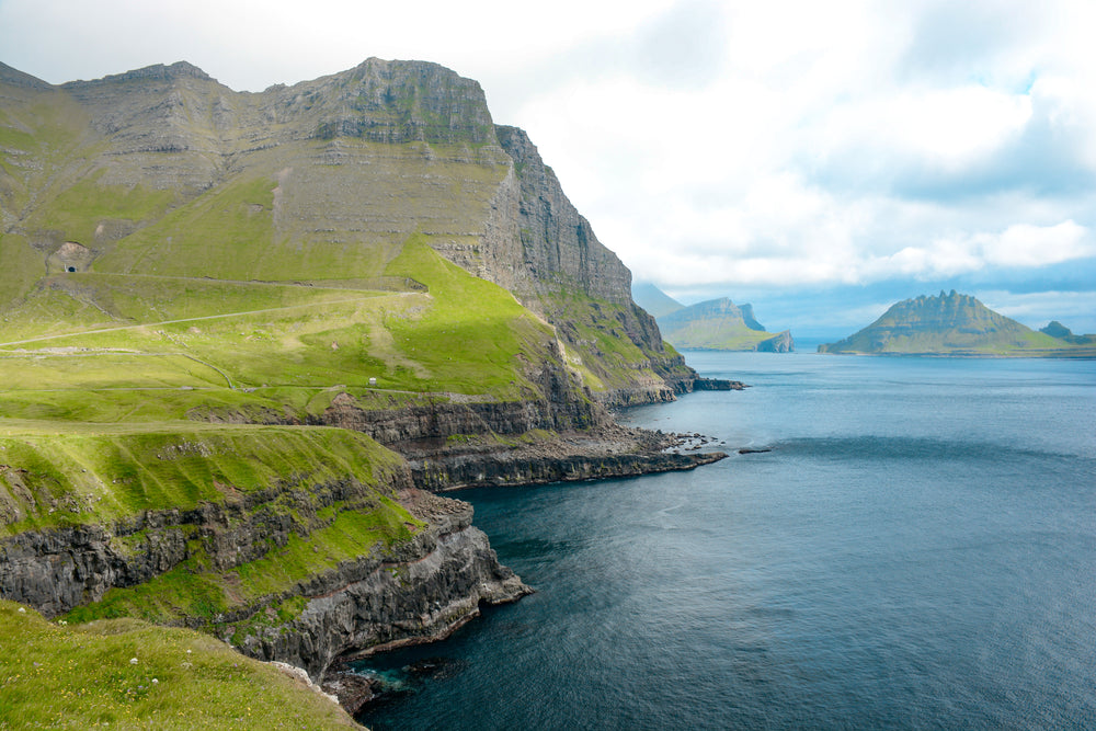 pristine mountainous coastline off faroe islands