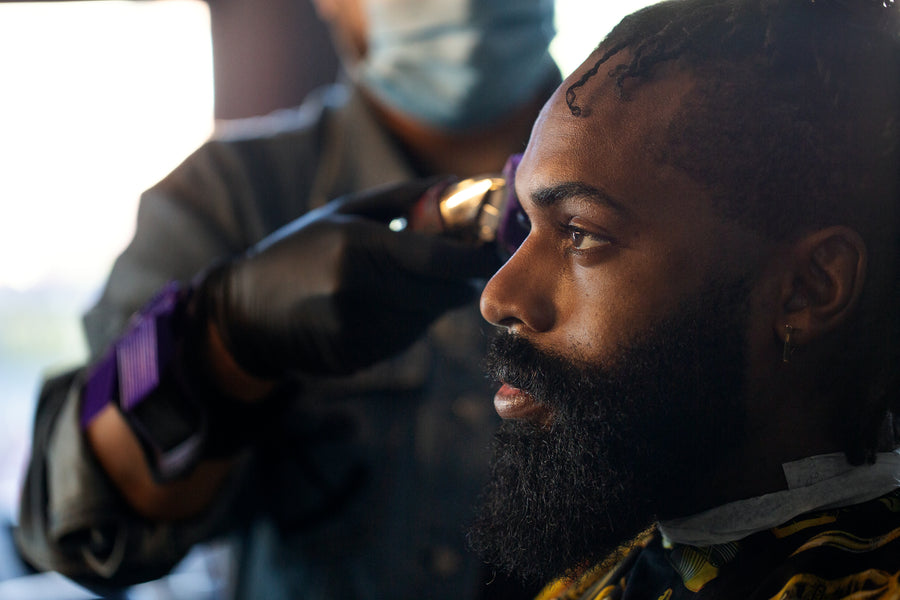 Profile of man at the barber