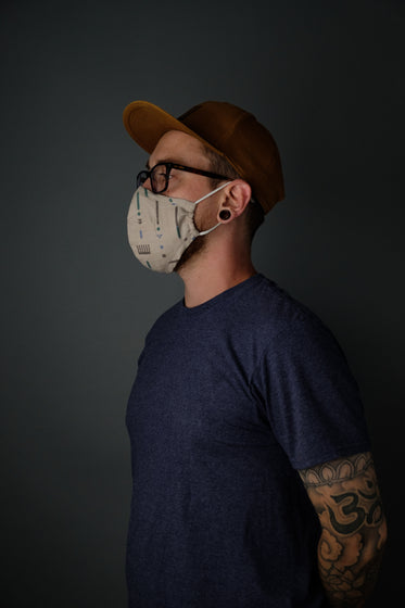 profile of man wearing mask