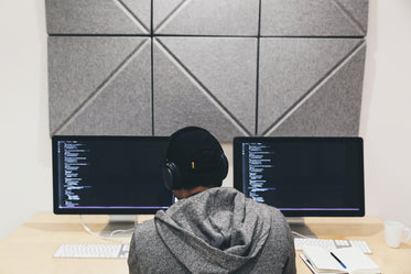 Free Stock Photo of Programmer Focused On Code — HD Images