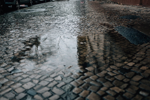 puddle on a cobble street