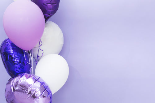 purple balloons on the left side