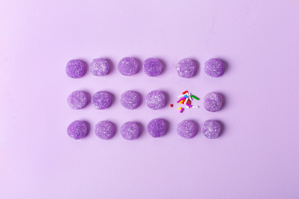 purple candy with sprinkles background