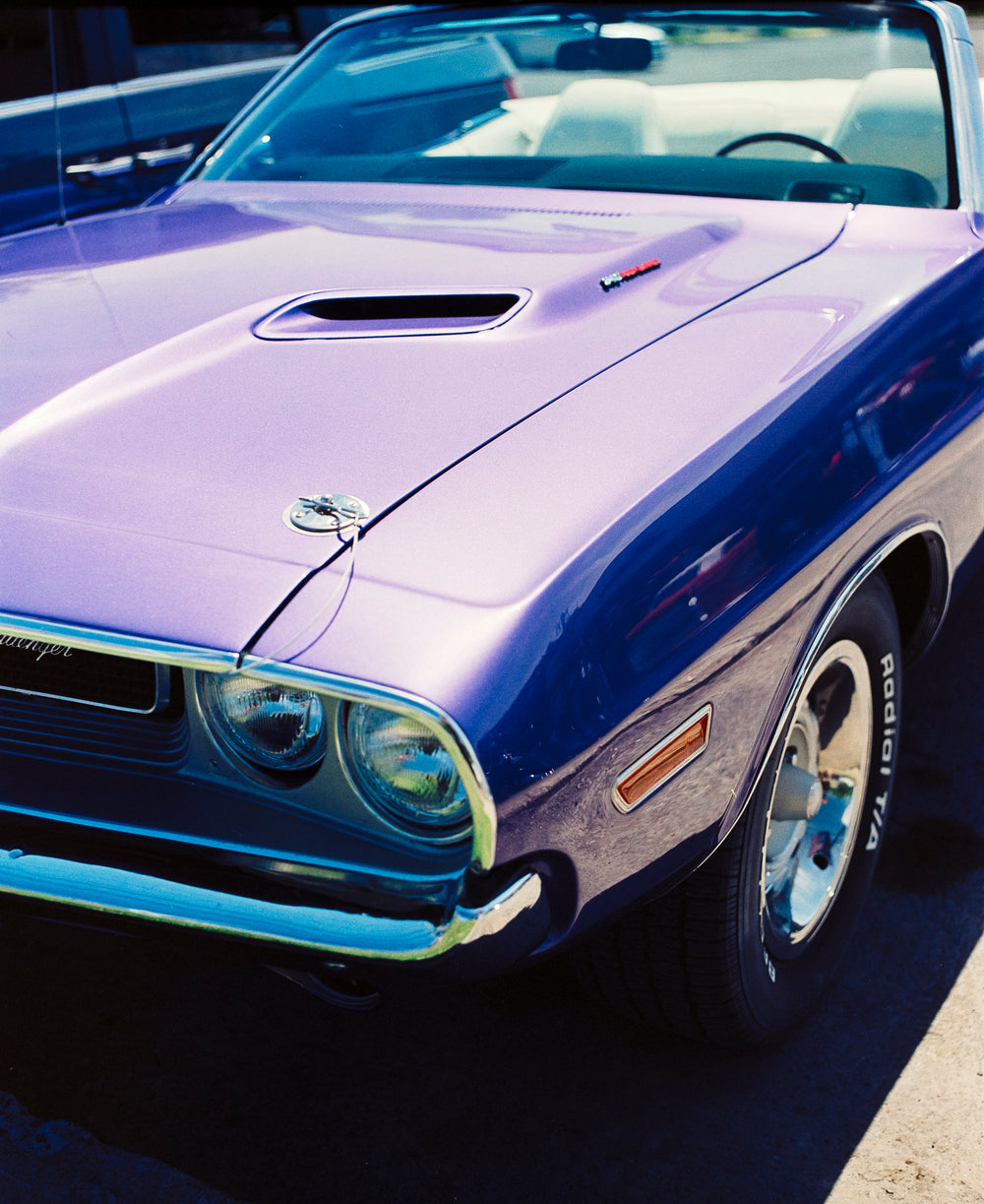 purple convertible car