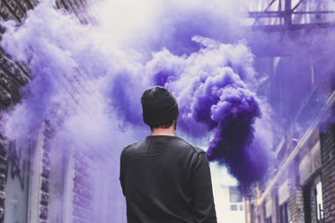 purple smoke in the ally