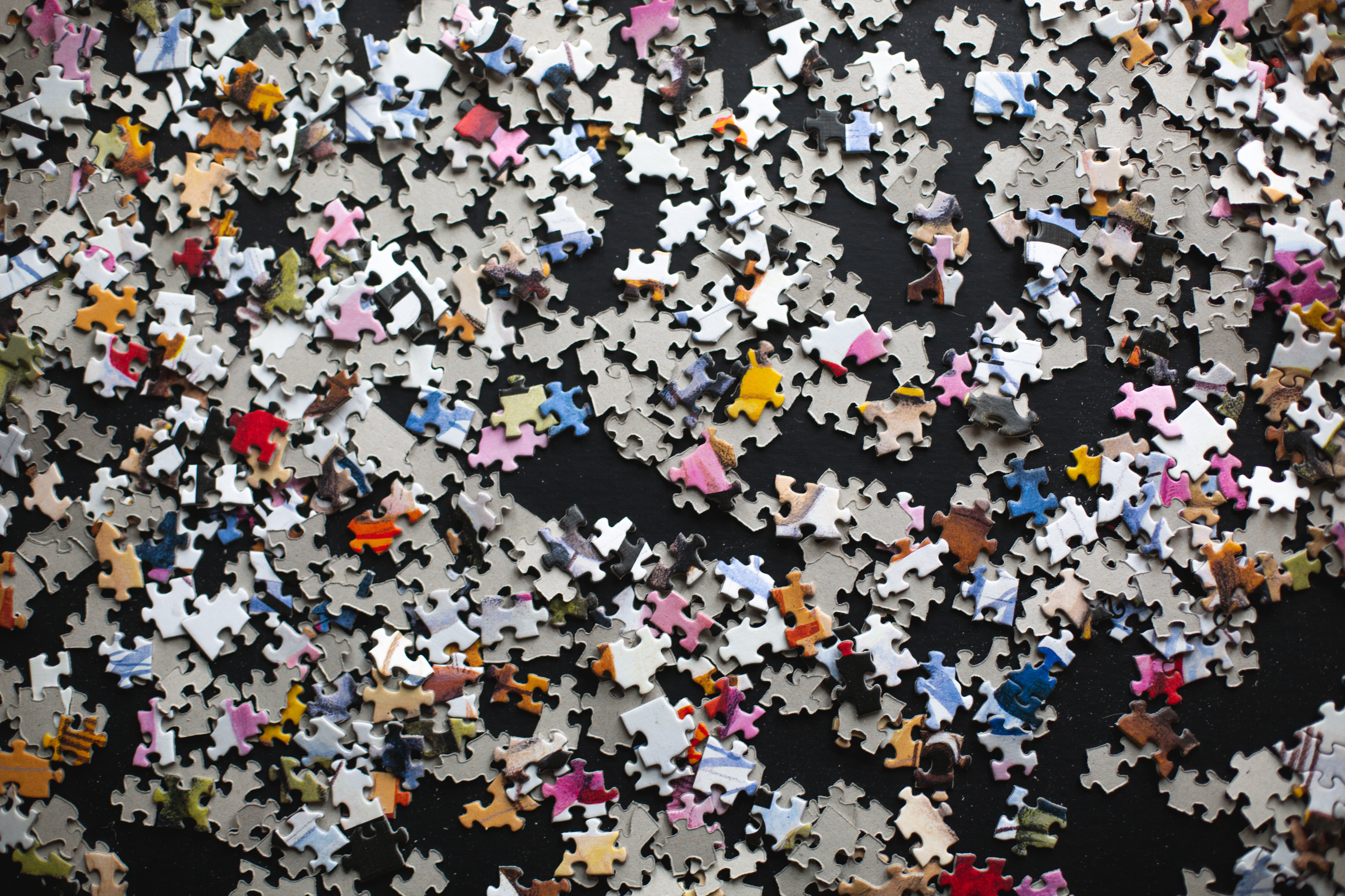 puzzle-pieces-on-a-black-background.jpg?width\u003d746\u0026format\u003dpjpg\u0026exif\u003d0\u0026iptc\u003d0