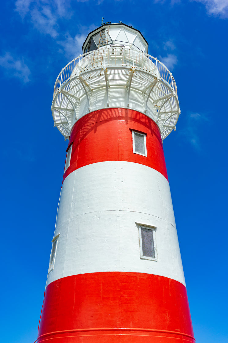 rad-and-white-lighthouse-on-blue-sky.jpg